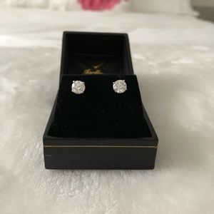Pair of 14K white gold Diamond studs. 1.4 CT